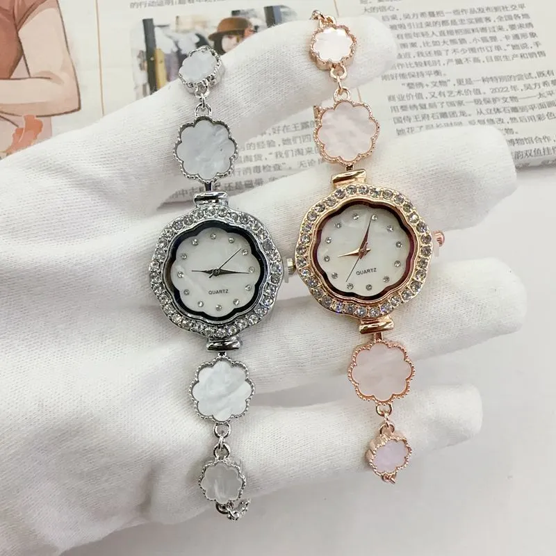 Light luxury, niche temperament, diamond-encrusted flower-shaped drawstring bracelet watch