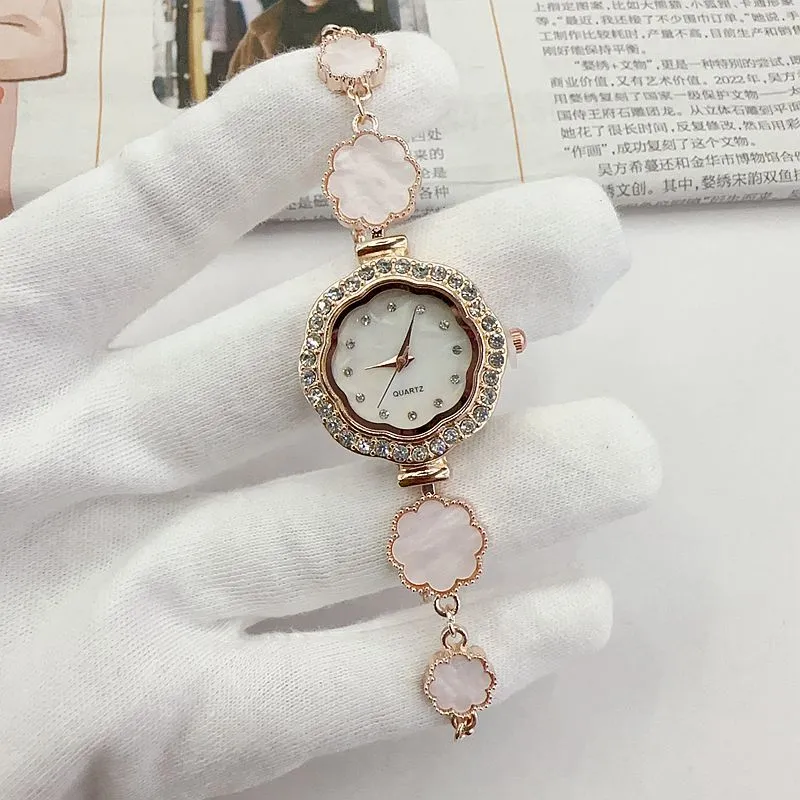 Light luxury, niche temperament, diamond-encrusted flower-shaped drawstring bracelet watch